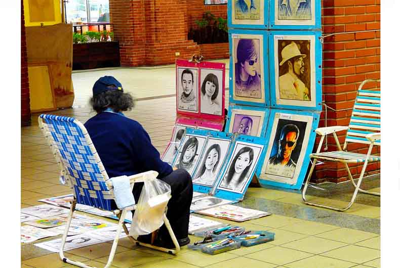 Fired for being lenient with students, teacher sells paintings on