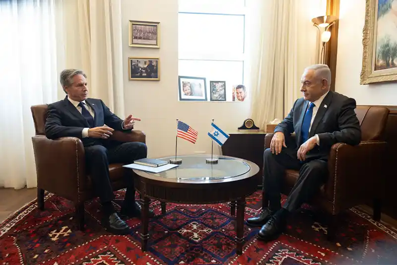 Gun in one hand, bomb in other - Gaza ceasefire in Netanyahu style